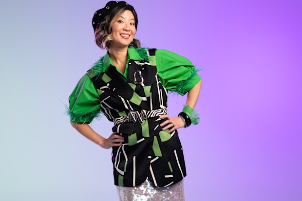 Candice Hung, ovarian cancer survivor, gets dressed up for OCRF Frocktober initiative.