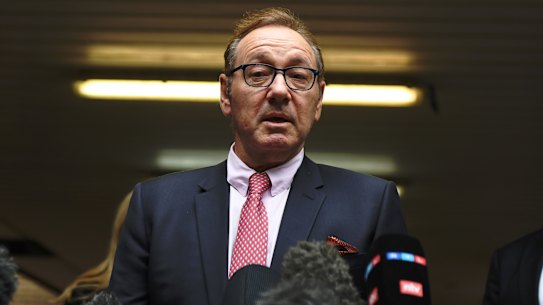 Kevin Spacey speaks to press after leaving court at Southwark Crown Court on Wednesday.