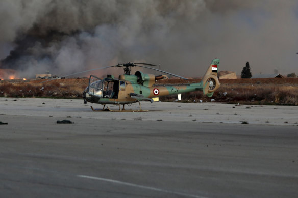 Smoke rises in the aftermath of suspected IDF strikes near Mezzeh Air Base in Damascus.