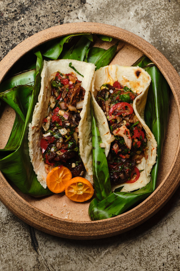 Wood roasted pig’s head tacos with egg butter.