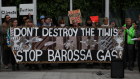 Protesters outside the Federal Court in Melbourne during a Santos appeal hearing over the Barossa gas project.