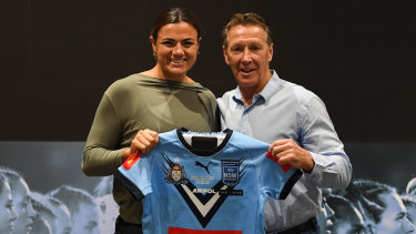 Millie Boyle gets here NSW jersey from Craig Bellamy.