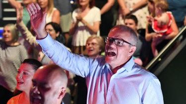 Scott Morrison sings during an Easter Sunday service at his Pentecostal church, Horizon, in Sydney.
