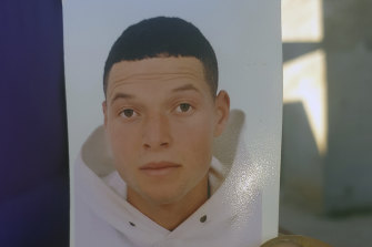 A photo of Nice attacker Brahim Aouissaoui, held by his brother Yassine. 