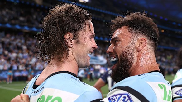 Nicho Hynes and Toby Rudolf celebrate the Sharks’ finals win.