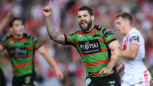 Sharp-shooter: Adam Reynolds celebrates kicking the winning field goal with 20 seconds on the clock.