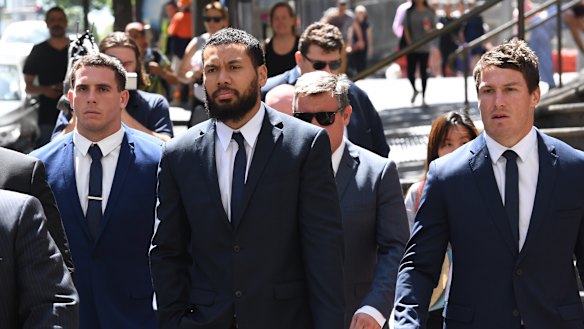 Adam Elliott, Asipeli Fine and Josh Jackson leave the Downing Centre Court in December last year. 