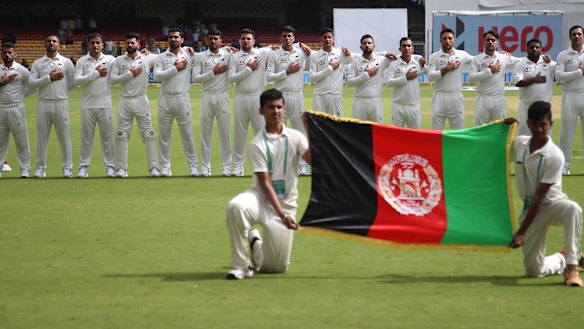 Afghanistan's players line up for the national anthem in their first ever Test in 2018.
