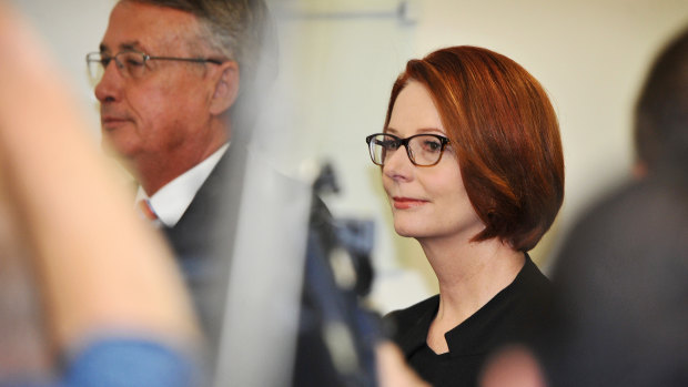 Wayne Swan with Julia Gillard after Kevin Rudd resumed the leadership in 2013. 