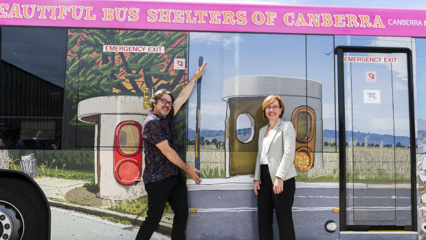 Canberra artist Trevor Dickinson and Transport Minister Meegan Fitzharris with the new bus wrapped in Dickinson's bus-stop artwork.