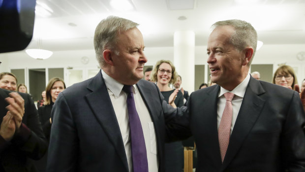 The new Labor leader Anthony Albanese  with former leader Bill Shorten at a caucus meeting on Thursday.