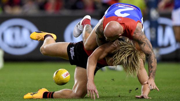 Nathan Jones tackles Dyson Heppell.