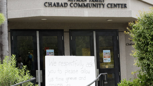 A sign asks for time to grieve at the Chabad of Poway synagogue.