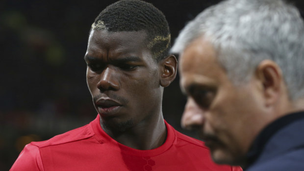 Symptomatic relationship: Paul Pogba with Jose Mourinho. The French star's relationship with the manager had deteriorated alarmingly.