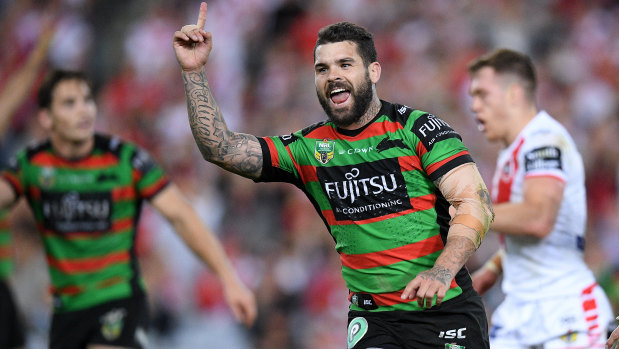 Sharp-shooter: Adam Reynolds celebrates kicking the winning field goal with 20 seconds on the clock.