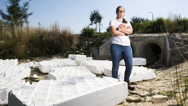 Cate Ruth stands at a Moncreiff pond where polystyrene has accumulated. 