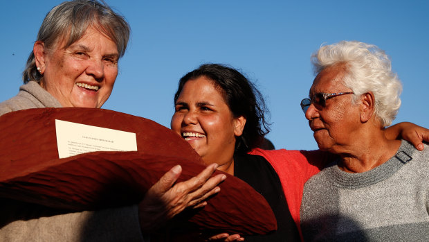 Pat Anderson with a piti holding the Uluru Statement from the Heart, with Sally Scales and Irene Davey, in May 2017.