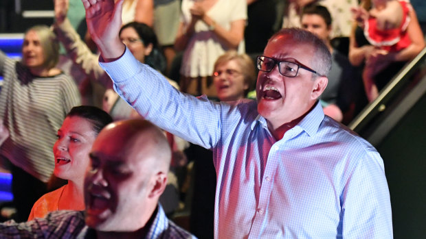 Scott Morrison sings during an Easter Sunday service at his Pentecostal church, Horizon, in Sydney.