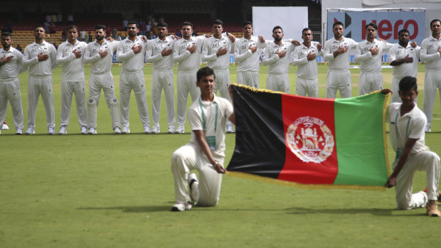Afghanistan's players line up for the national anthem in their first ever Test in 2018.