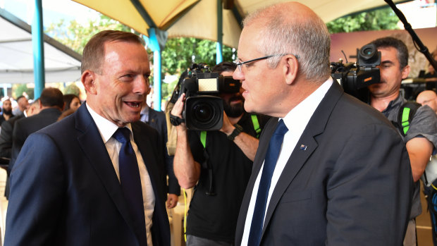 Former prime minister Tony Abbott and Prime Minister Scott Morrison at a Good Friday Easter service in Punchbowl.