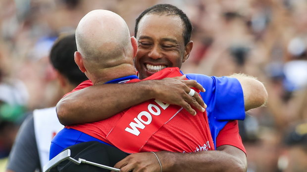 Drought over: Tiger Woods celebrates with caddie Joe LaCava after the Tour Championship golf tournament and the FedEx Cup final at Eastlake Golf Club in Atlanta, Georgia.