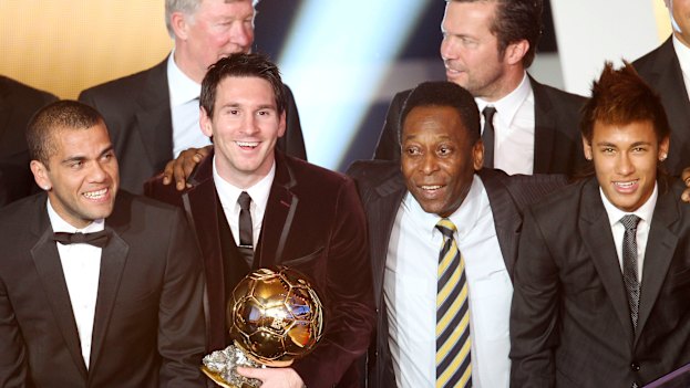 Brazil’s Dani Alves, Argentina’s Lionel Messi, Brazil’s soccer legend Pele and Brazil’s Neymar, from left, stand together after Messi was awarded the prize for the soccer player of the year 2011 at the FIFA Ballon d’Or ceremony in Zurich.