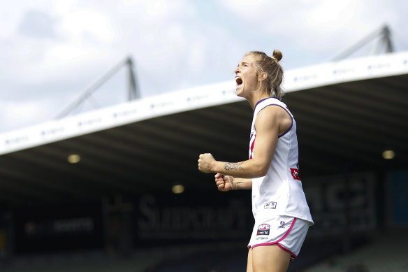 Jasmin Stewart celebrates a Dockers goal in their come-from-behind victory.