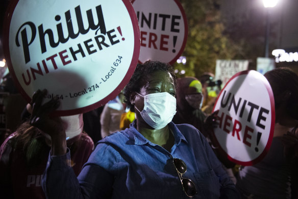 Philadelphia residents danced in he street at a rally in support of counting every vote. 