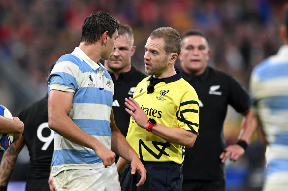 Juan Martin Gonzalez of Argentina speaks to referee Angus Gardner during the World Cup semi-final.