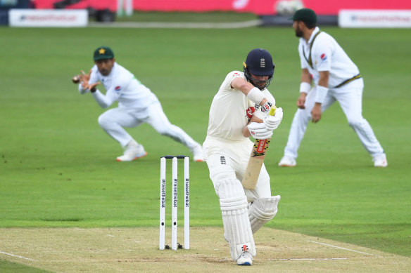 Asad Shafiq takes the catch to dismiss Rory Burns on a rain-shortened fourth day of the second Test in Southampton.