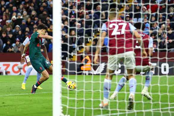 Stefan Bajcetic of Liverpool scores their side’s third goal