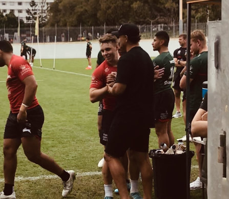 Blake Taaffe and Latrell Mitchell greet each other on Tuesday.