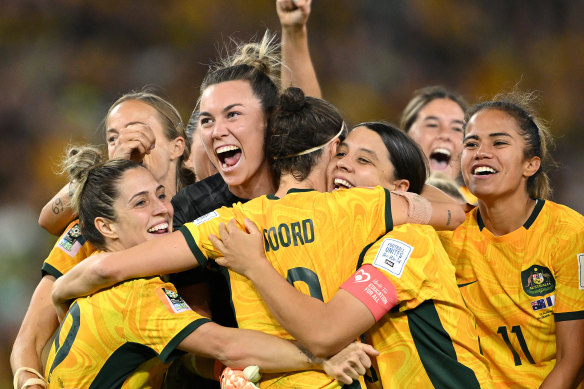 The Matildas celebrate Cortnee Vine’s clutch penalty against France.