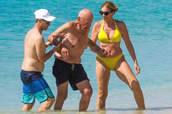 Murdoch enjoys the Barbados sun in the company of Ann-Lesley Smith last year.