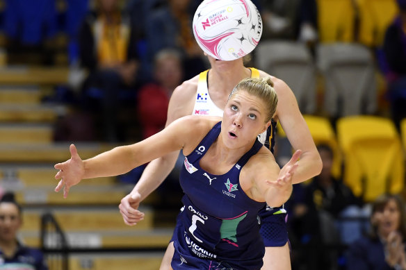 Eye on the ball: Kate Moloney impressed in her 100th game.