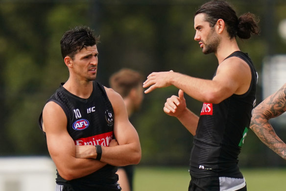 Coming to terms: Pies stars including captain Scott Pendlebury (left) and ruckman Brodie Grundy face uncertainty on the contract front.