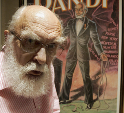 James Randi is shown in front of a poster at his home in Fort Lauderdale, Florida, 2007. 