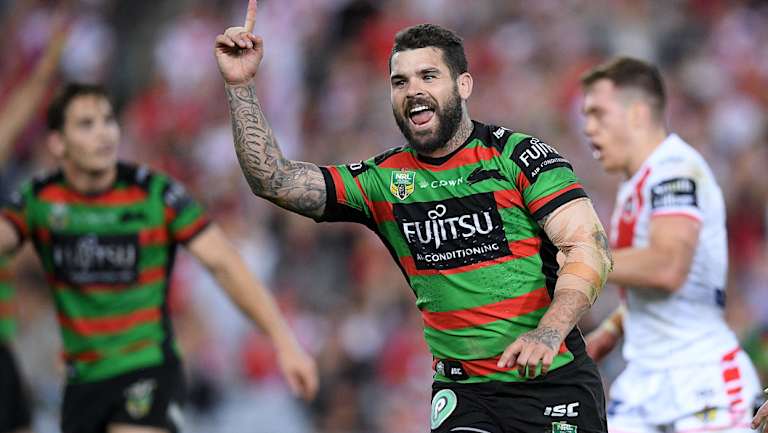 Sharp-shooter: Adam Reynolds celebrates kicking the winning field goal with 20 seconds on the clock.