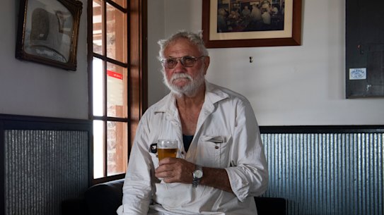 Local Sidney Kinsey having a beer at the Nevertire Hotel.