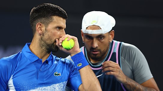 Novak Djokovic and Nick Kyrgios talk tactics during their match in Brisbane in 2024.