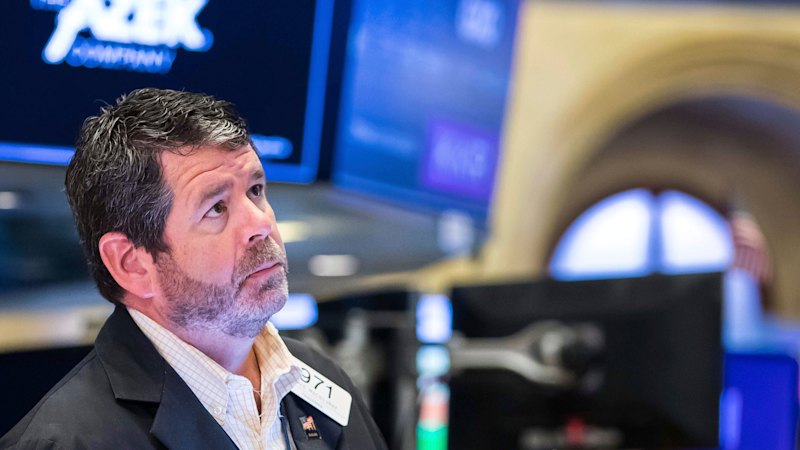 Wall Street wobbles on jobs report, ASX set for flat start; Australian dollar jumps