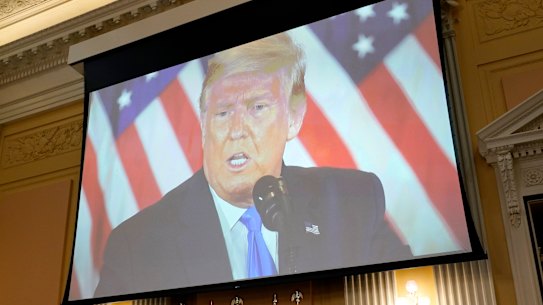 A video of former US president Donald Trump is displayed as members of the House select committee to investigating the January 6 attack on the US Capitol held its last public meeting on December 19.