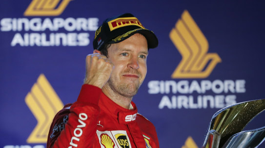 Sebastian Vettel celebrates a grand prix win for Ferrari last year.