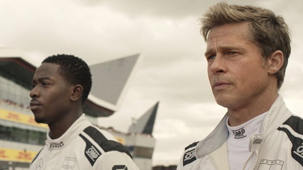 Damson Idris as Joshua Pearce and Brad Pitt as Sonny Hayes in a scene from “F1: The Movie.”