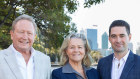 Andrew and Nicola Forrest with Minderoo boss John Hartman on the banks of the Swan River in Perth on Tuesday.