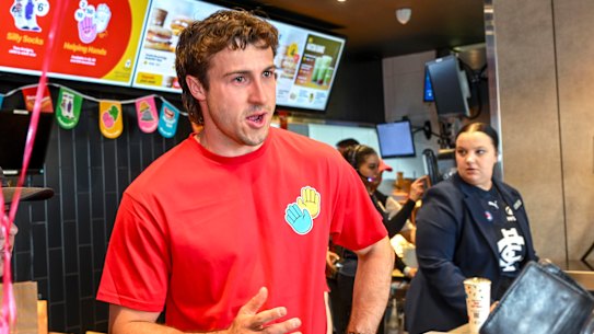 Essendon star Andrew McGrath on McHappy Day at McDonalds in Tullamarine on Saturday.