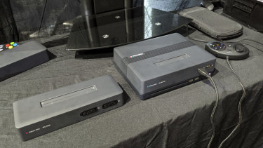 On the right, the Polymega base with the Mega Drive / Genesis / 32X module inserted. On the left, the Super Nintendo / Super Famicom module.