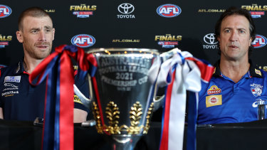 Melbourne coach Simon Goodwin and his Bulldogs counterpart Luke Beveridge at a grand final media conference in Perth on Friday.