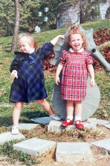 Author Hannah Bent (right) aged 2, with and her sister Camilla (aged 5).