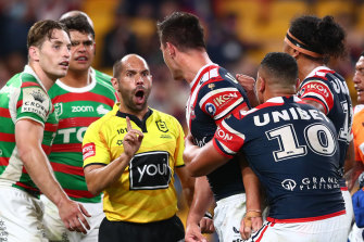 Roosters centre Joseph Manu confronts South Sydney’s Latrell Mitchell.